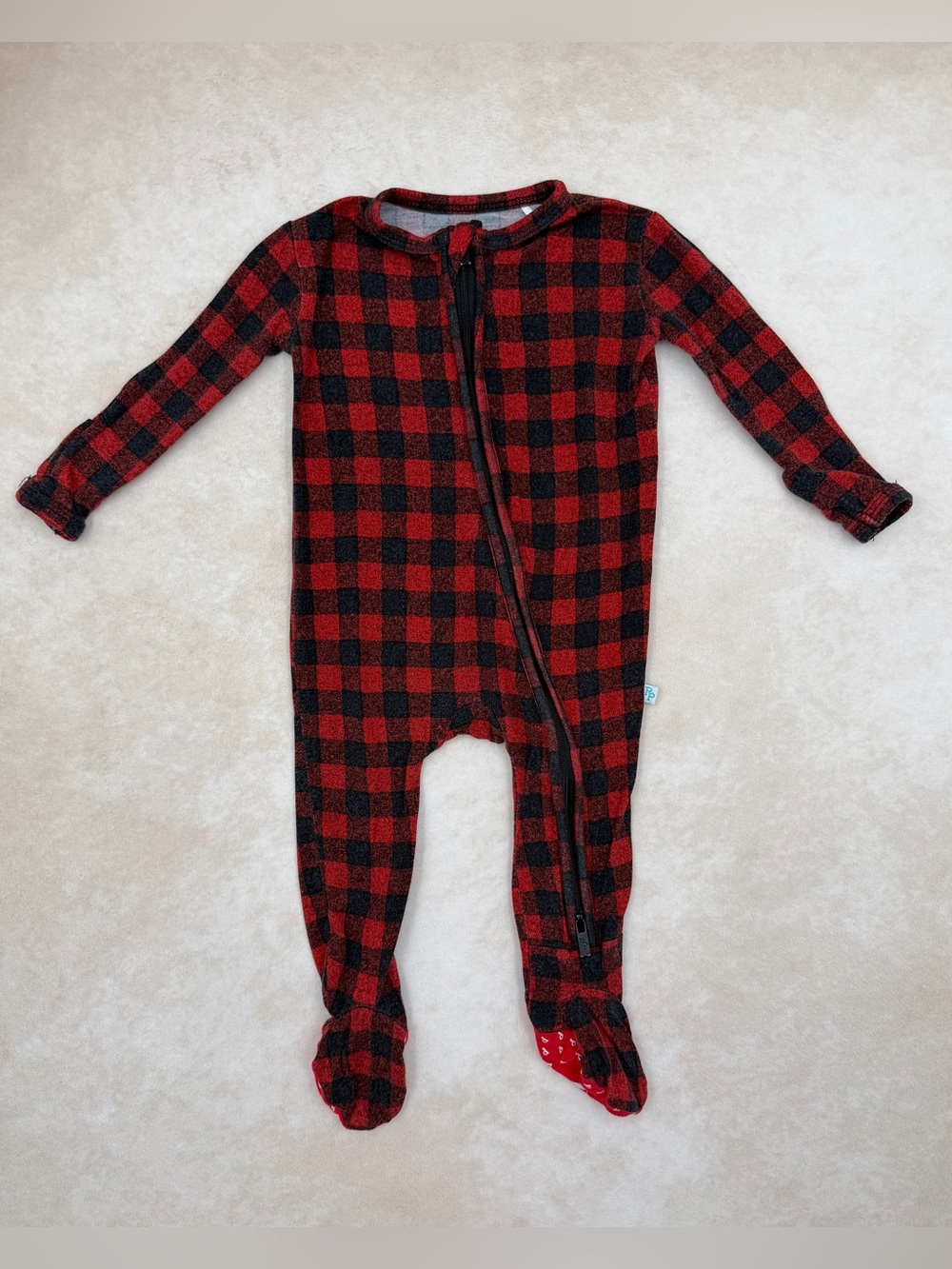 Posh Peanut Red and Black Buffalo Plaid Footed One-Piece